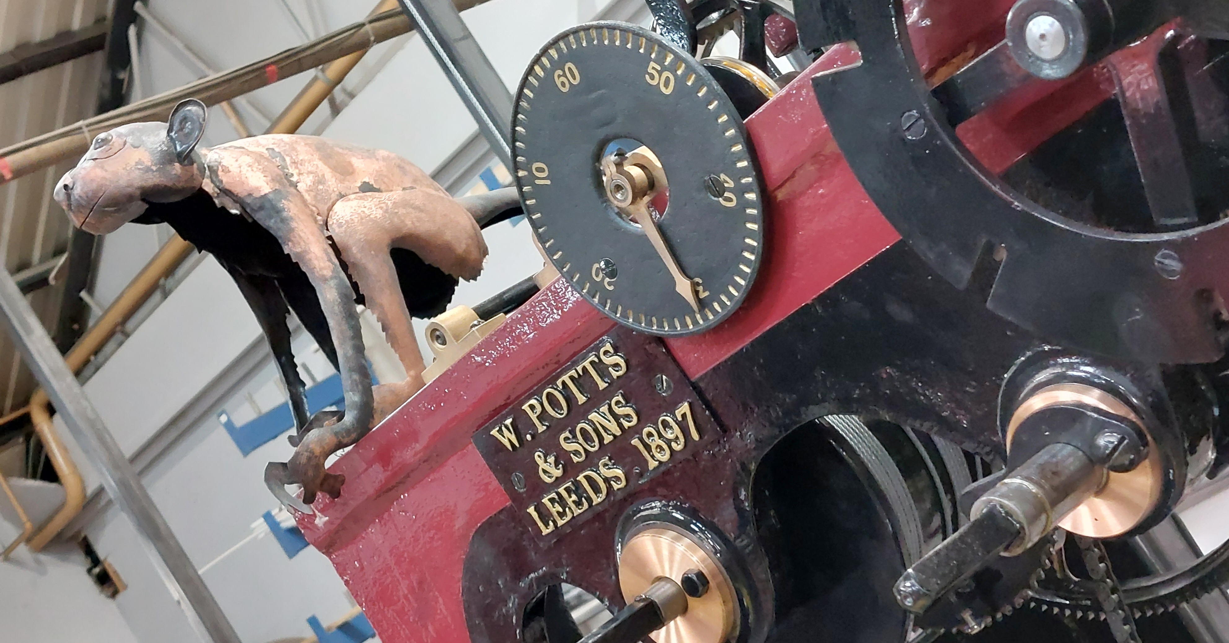 One of the mischievous burnished copper monkeys on the Cardiff Pierhead Clock 