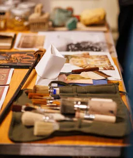 Conservation tools used at the Maison Dieu, displayed at St Mary's Church.
