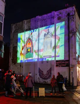 School art work being projected on to wall.