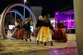 The Fuddlers dancing in the Market Square.