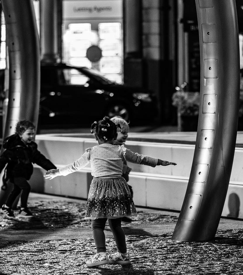 Children dancing in the Market Square. Children dancing in the Market Square.