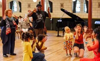 People at event inside Maison Dieu