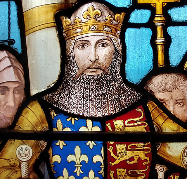 Stained glass window detail of medieval king